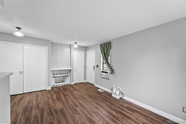 17004 E Tennessee Dr Unit 103, Aurora, CO 80017 - below grade area with wood finished floors and baseboards
