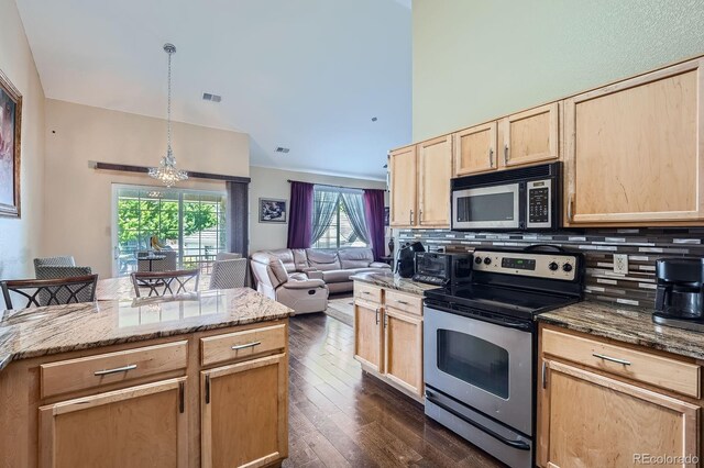 22560 E Ontario Dr Unit 204, Aurora, CO 80016 - kitchen featuring appliances with stainless steel finishes, light brown cabinets, a chandelier, and decorative backsplash