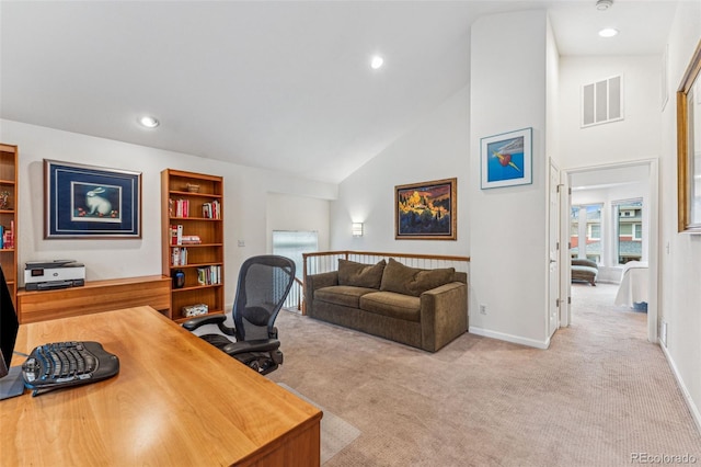 office area with visible vents, built in shelves, recessed lighting, baseboards, and light colored carpet