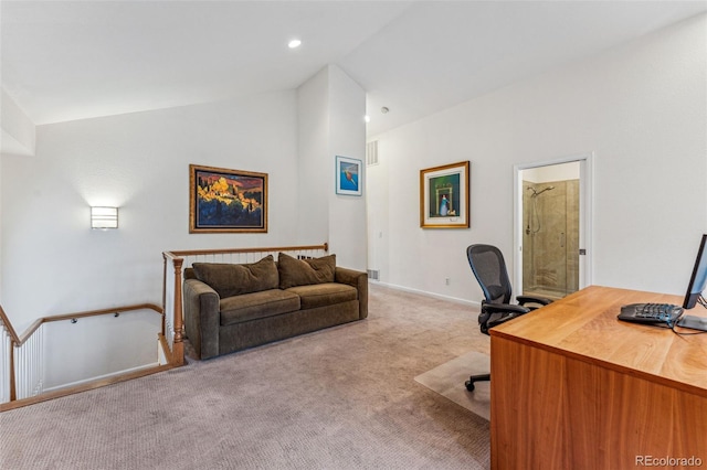 home office with visible vents, baseboards, light colored carpet, lofted ceiling, and recessed lighting