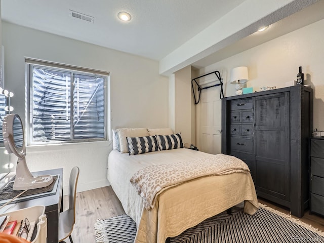 6366 Umber Cir, Arvada, CO 80403 - bedroom featuring light wood-style flooring, baseboards, and recessed lighting