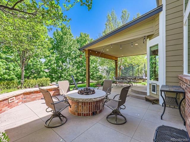 6366 Umber Cir, Arvada, CO 80403 - view of patio featuring an outdoor fire pit and outdoor dining space