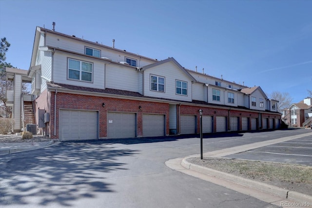 exterior space featuring sidewalks and curbs