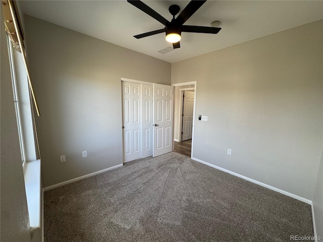 13013 Grant Cir Unit C, Thornton, CO 80241 - unfurnished bedroom featuring carpet, a closet, and ceiling fan