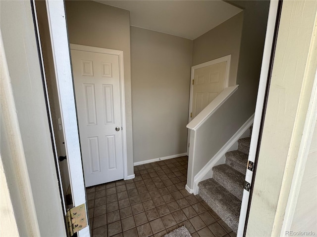 13013 Grant Cir Unit C, Thornton, CO 80241 - stairs featuring tile patterned floors and baseboards