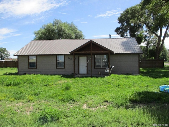 ranch-style house with a front yard