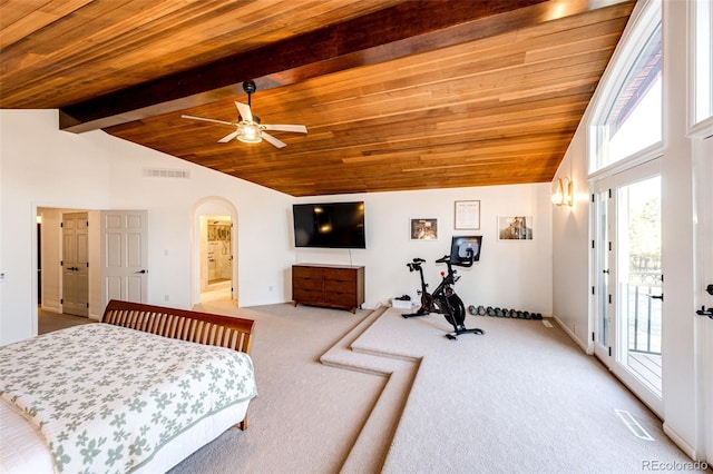 carpeted bedroom featuring vaulted ceiling with beams, wood ceiling, visible vents, and arched walkways