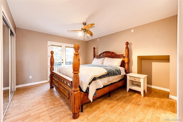 bedroom featuring access to outside, a closet, light wood-style flooring, and baseboards