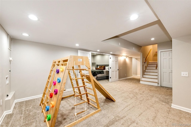 playroom featuring carpet, baseboards, and recessed lighting