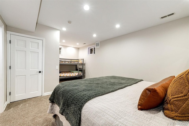 bedroom featuring carpet floors, visible vents, and recessed lighting