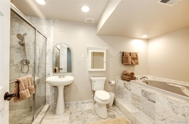 full bath featuring visible vents, a garden tub, a shower stall, and toilet