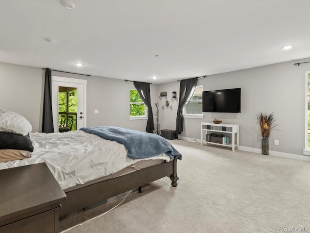 280 E 11th Ave, Broomfield, CO 80020 - bedroom with recessed lighting, access to outside, and light colored carpet