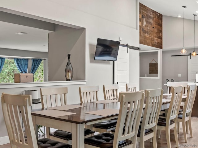 280 E 11th Ave, Broomfield, CO 80020 - dining area featuring a barn door