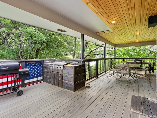 280 E 11th Ave, Broomfield, CO 80020 - wooden terrace with area for grilling and outdoor dining space