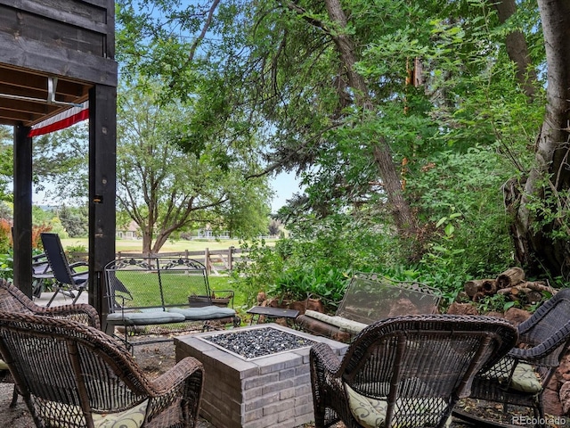 280 E 11th Ave, Broomfield, CO 80020 - view of patio featuring a fire pit