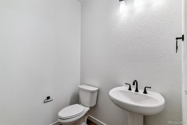25284 E Warren Pl, Aurora, CO 80018 - half bath with toilet and a sink