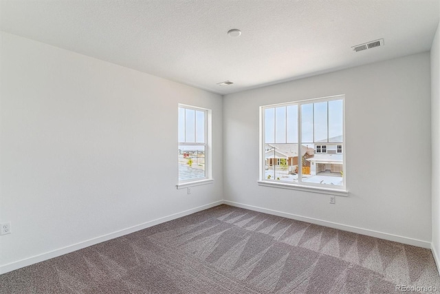 25284 E Warren Pl, Aurora, CO 80018 - carpeted spare room featuring healthy amount of natural light