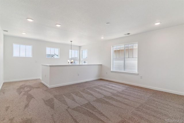 25284 E Warren Pl, Aurora, CO 80018 - carpeted empty room featuring a chandelier, recessed lighting, and a textured ceiling