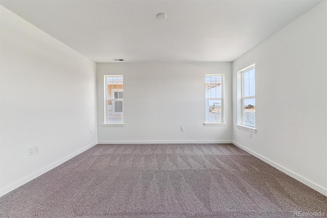 25284 E Warren Pl, Aurora, CO 80018 - empty room with carpet flooring and baseboards