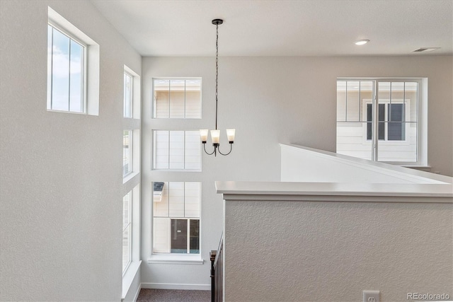 25284 E Warren Pl, Aurora, CO 80018 - interior space featuring a chandelier and plenty of natural light