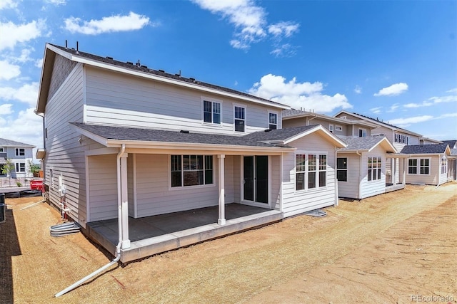 25284 E Warren Pl, Aurora, CO 80018 - back of property with a shingled roof