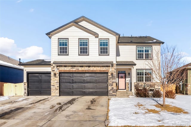 front of property with a garage