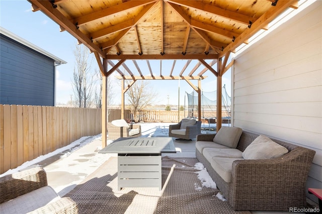 view of patio / terrace featuring an outdoor living space, a gazebo, and a pergola