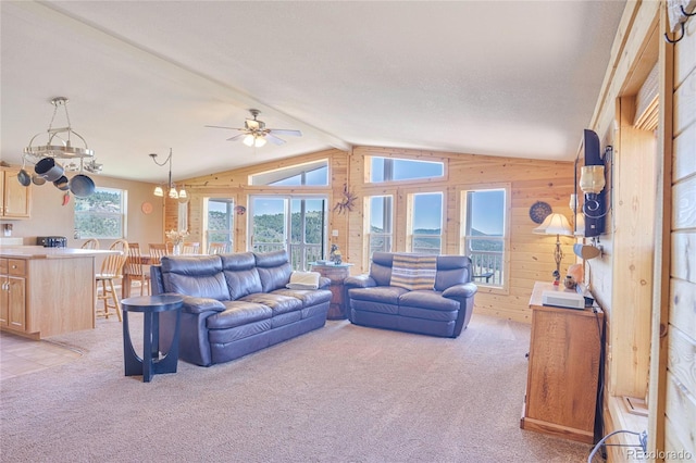 216 Rainbow Ridge Rd, Canon City, CO 81212 - living area with a ceiling fan, light carpet, and wooden walls