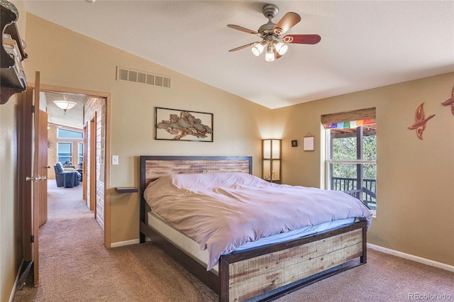 216 Rainbow Ridge Rd, Canon City, CO 81212 - bedroom featuring carpet flooring, vaulted ceiling, and a ceiling fan