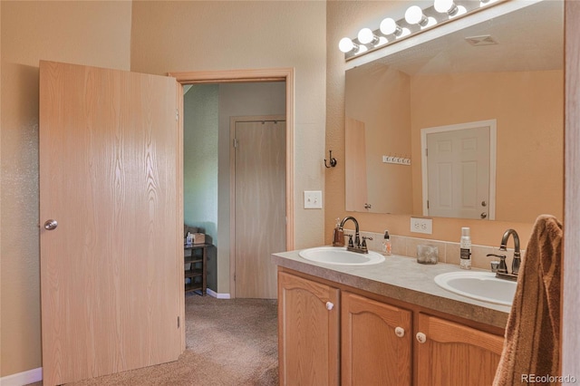 216 Rainbow Ridge Rd, Canon City, CO 81212 - bathroom with double vanity and baseboards