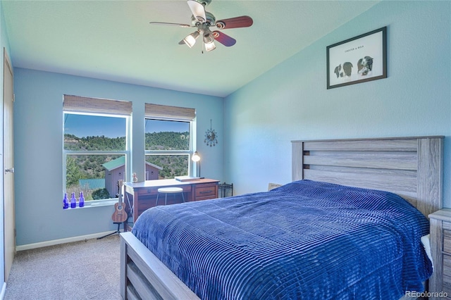 216 Rainbow Ridge Rd, Canon City, CO 81212 - carpeted bedroom with lofted ceiling and a ceiling fan