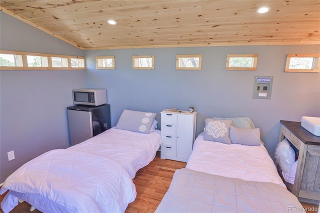 216 Rainbow Ridge Rd, Canon City, CO 81212 - bedroom with wooden ceiling, wood finished floors, recessed lighting, lofted ceiling, and multiple windows