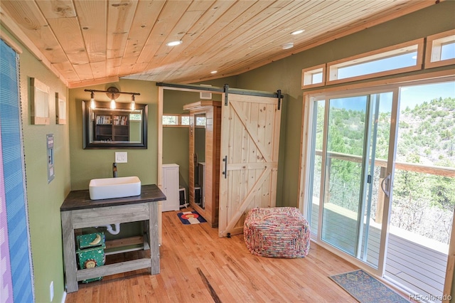216 Rainbow Ridge Rd, Canon City, CO 81212 - bathroom with recessed lighting, vanity, wooden ceiling, wood finished floors, and lofted ceiling
