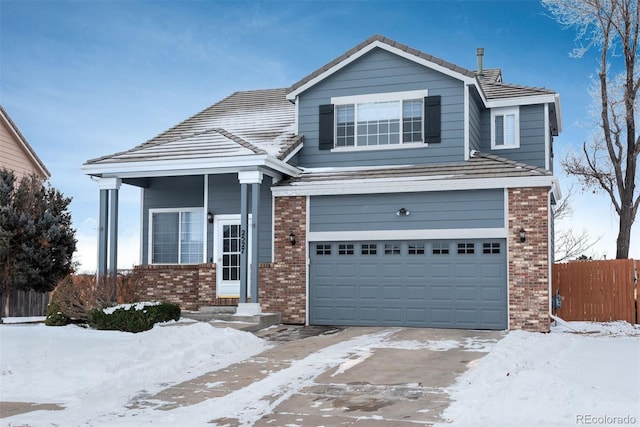 view of front of property featuring a garage