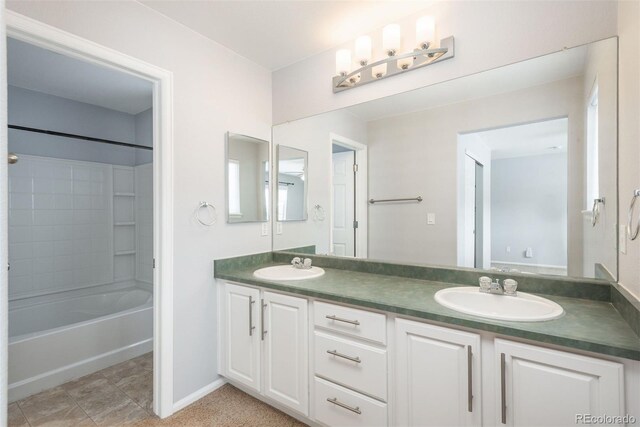 bathroom with shower / bathtub combination and vanity