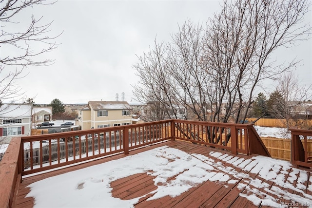 view of snow covered deck