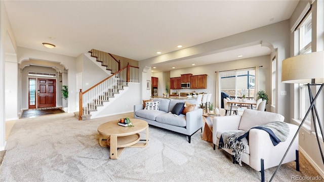 living room with light colored carpet