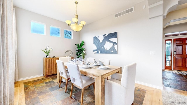 dining room featuring a chandelier