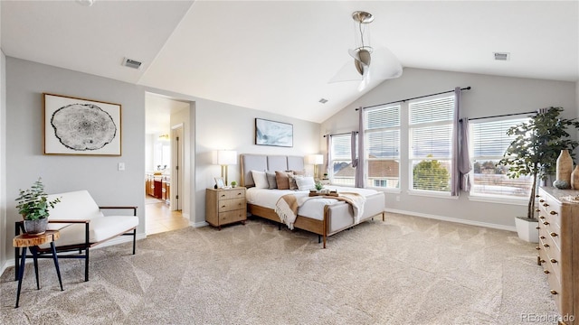 carpeted bedroom featuring lofted ceiling