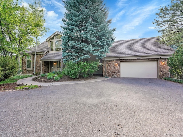 view of front of property with a garage