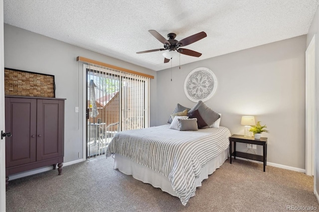carpeted bedroom featuring access to exterior, baseboards, a textured ceiling, and ceiling fan
