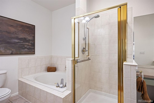 bathroom with a stall shower, tile patterned flooring, toilet, and a bath