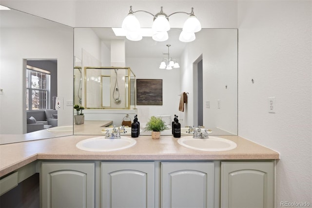 full bathroom with a stall shower, a sink, and double vanity