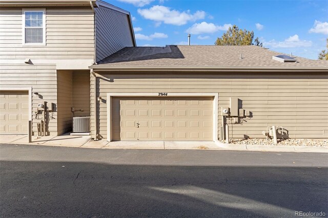 garage with central AC unit