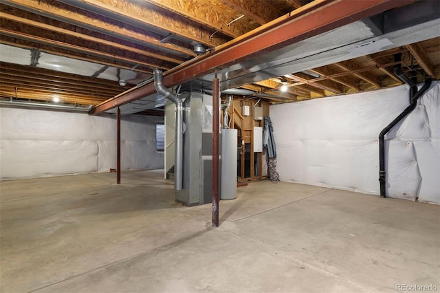 unfinished basement featuring gas water heater