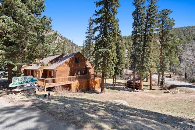 1400 David Dr Unit 1, Estes Park, CO 80517 - view of property exterior featuring a wooded view