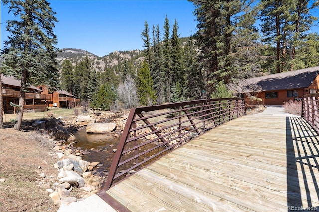 1400 David Dr Unit 1, Estes Park, CO 80517 - deck featuring a view of trees and a mountain view