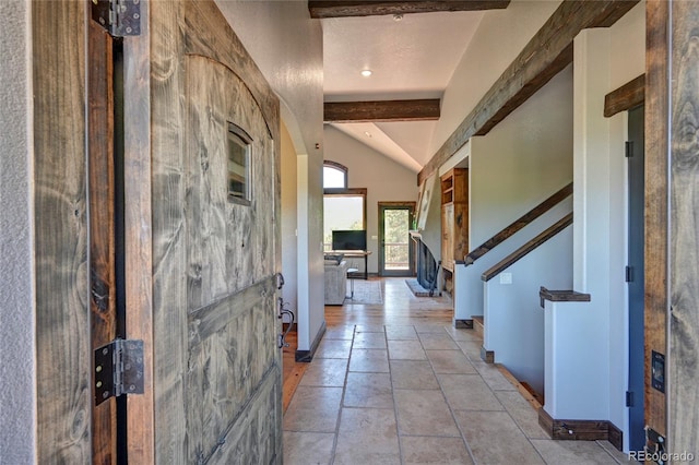 corridor featuring lofted ceiling with beams and tile patterned flooring