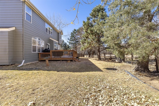 view of yard with a deck