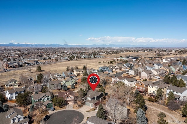 aerial view with a residential view and a mountain view